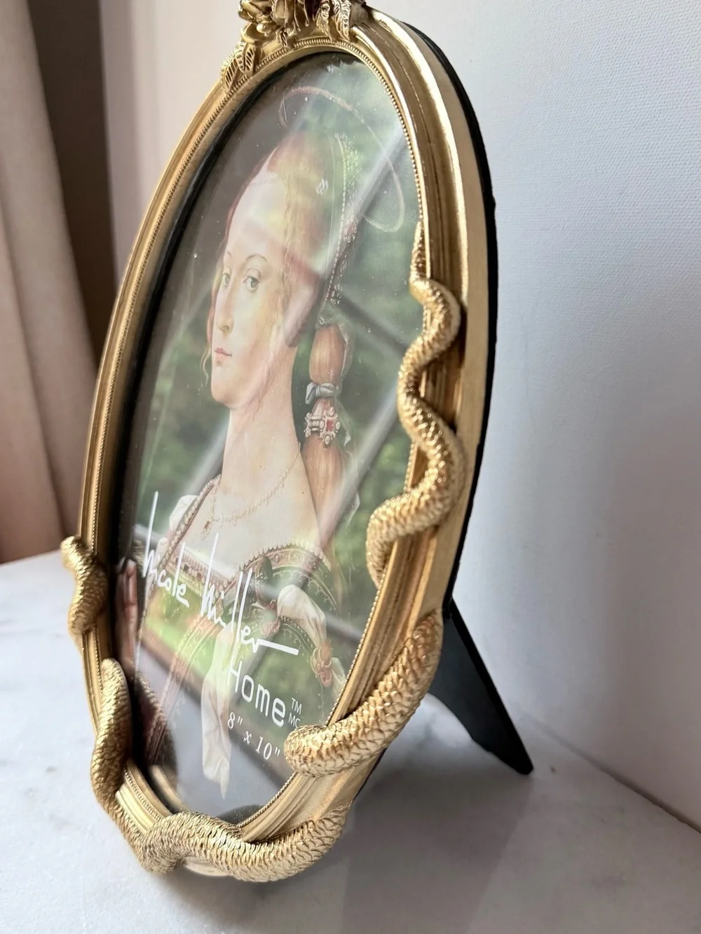 Nicole Miller decorative oval